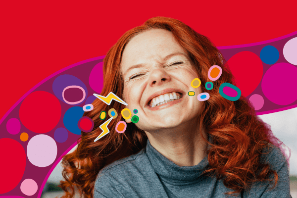 Girl smiling and showing off teeth
