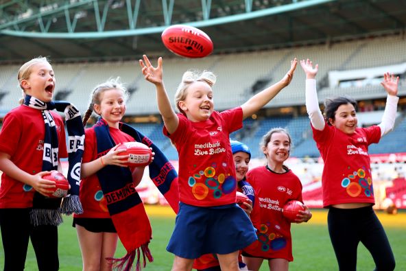 Young fans at the launch of Medibank’s new three-year partnership with the AFLW