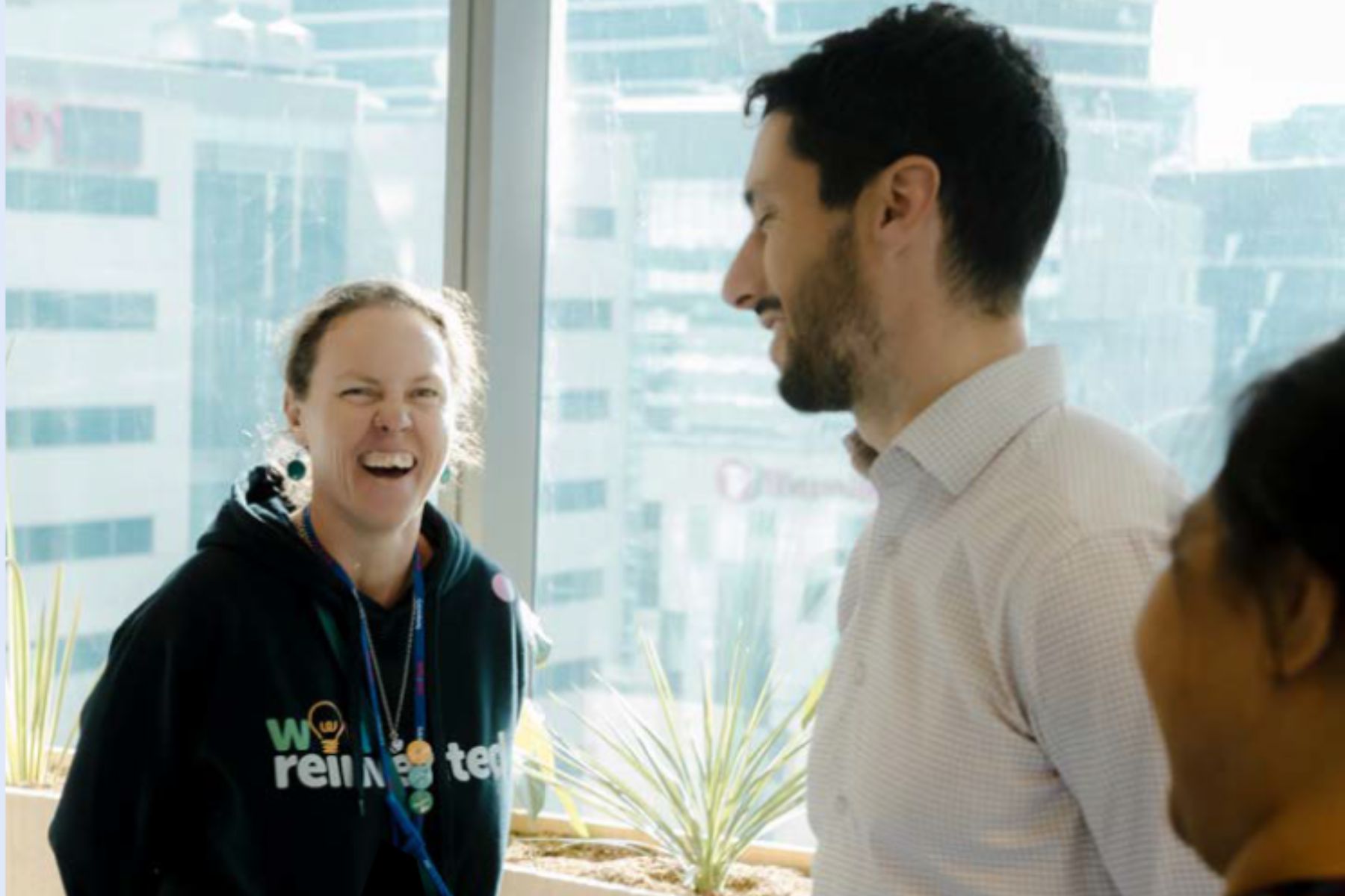 Employees laughing in the office