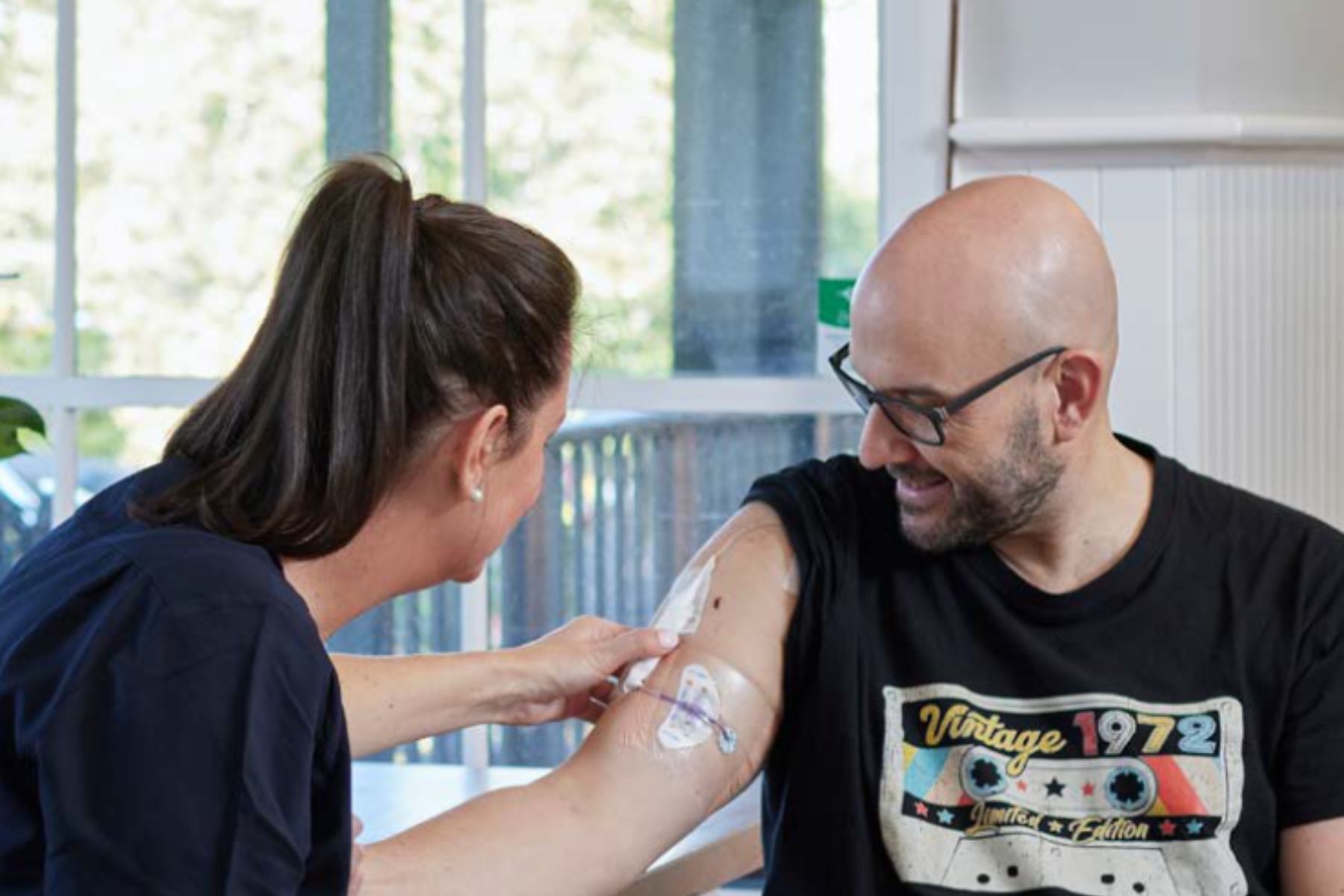 Nurse examining a patient's arm