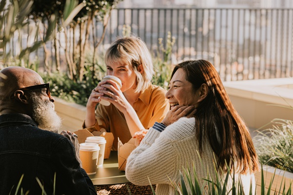 A group of friends talking over coffee